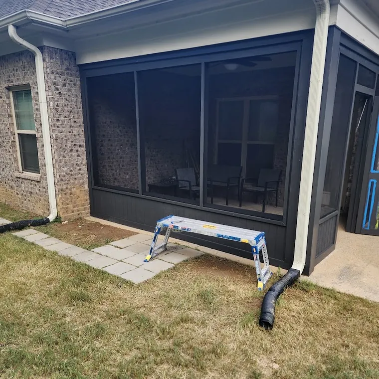 Screened porch enclosure with new window and door openings framed in